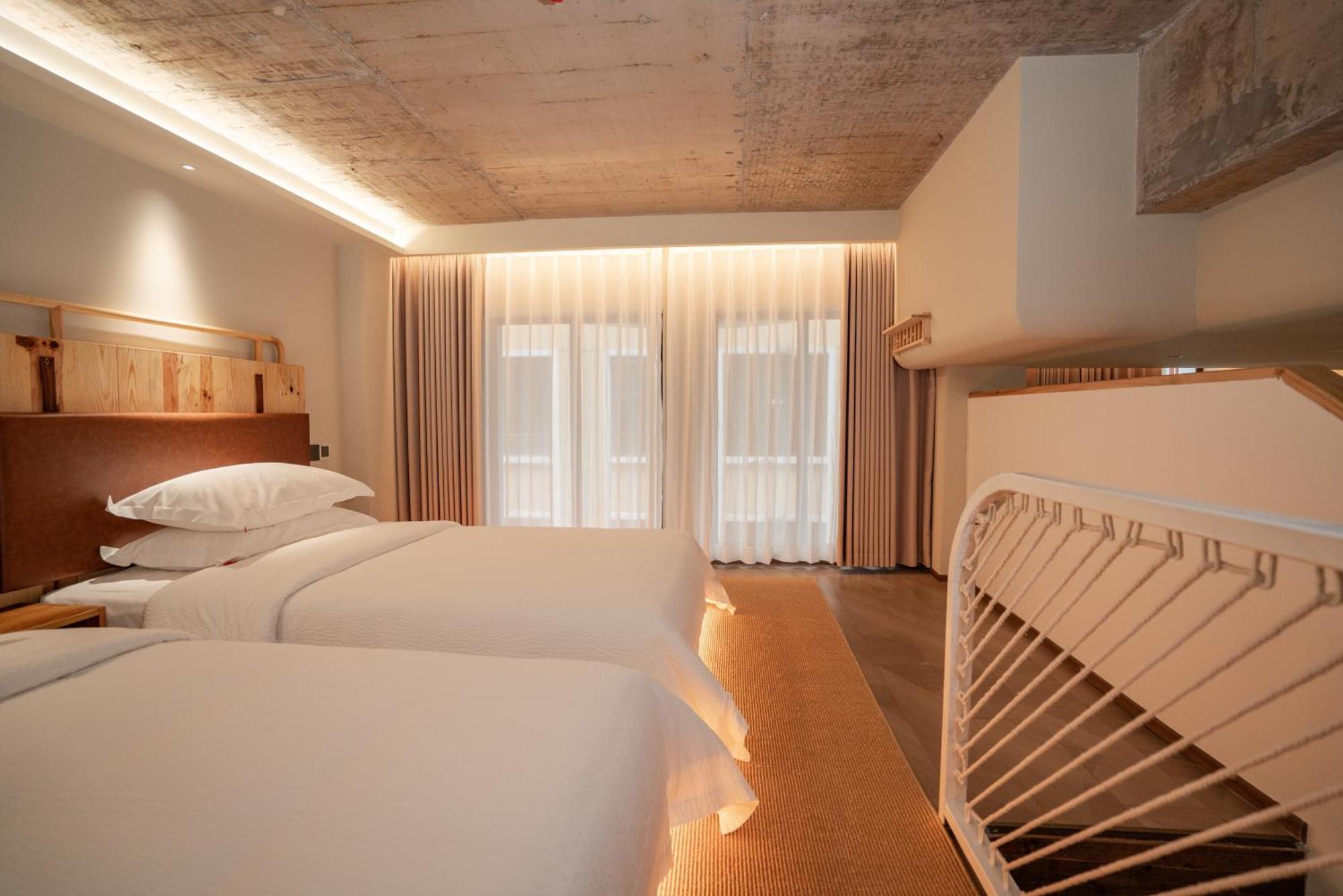 Patio Spring Holiday Inn -- Free Round Trip Pick-Up Service --Panoramic View Of Tianmen Mount Zhangjiajie Værelse billede