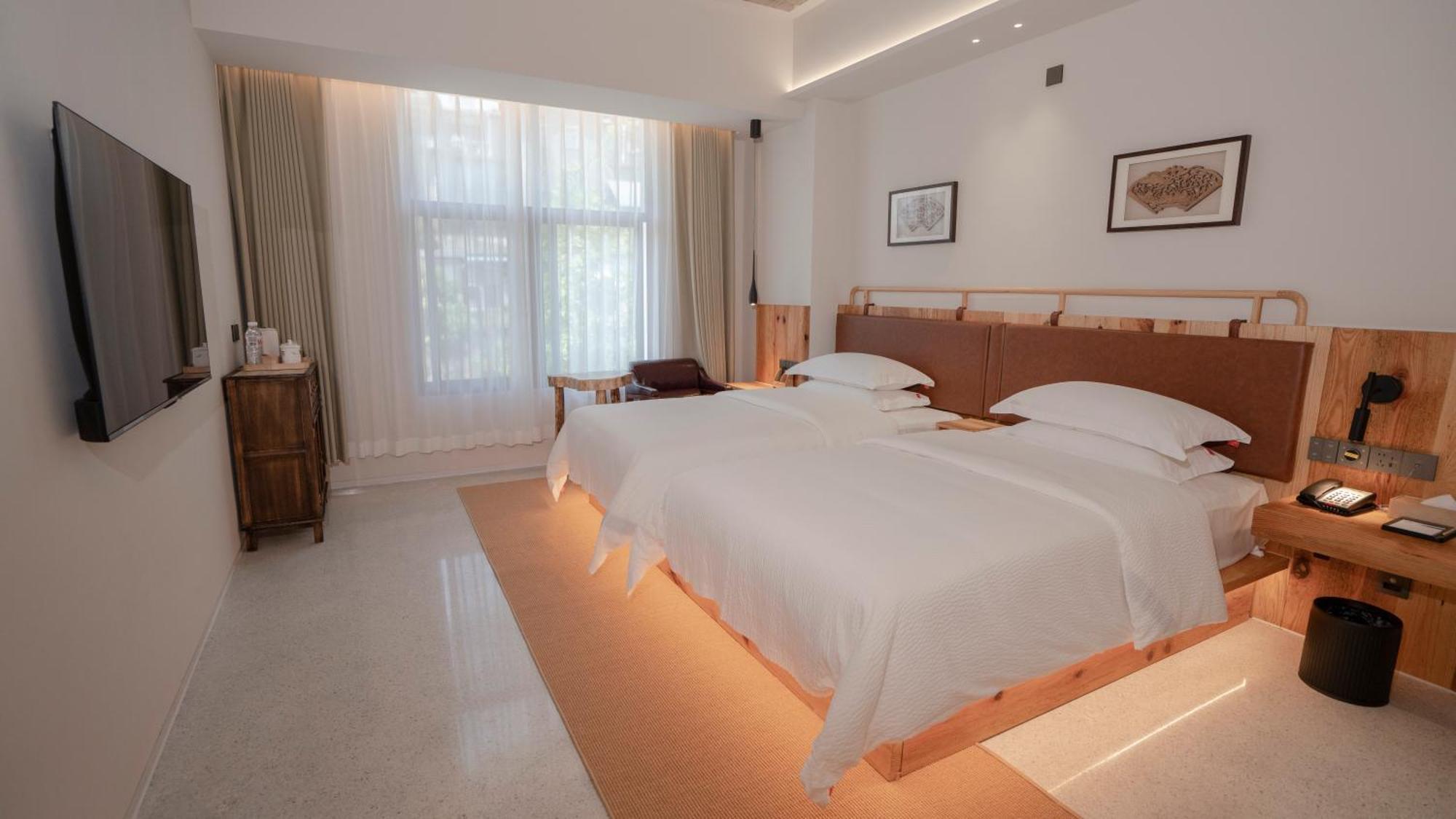 Patio Spring Holiday Inn -- Free Round Trip Pick-Up Service --Panoramic View Of Tianmen Mount Zhangjiajie Eksteriør billede
